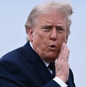 Donald Trump, whose quote about Bitcoin ($BTC) is featured in the post, is pictured here. The image shows a close-up of his face as he speaks.