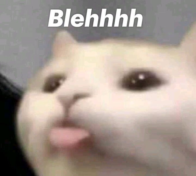 A close-up image of a white cat with its tongue slightly sticking out, overlaid with the text "Blehhhh" at the top.
