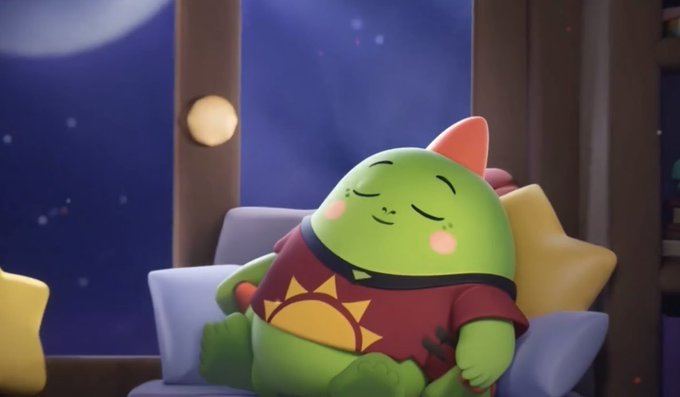 The image features a cartoon character wearing a red shirt with an orange sun design sitting comfortably on a couch. The character appears to be sleeping, which adds to the overall theme of relaxation and rest. The image also includes a caption that reads "Crypto never sleeps, and for a lot of people it feels like they can’t either. That's one reason @sleepagotchi stood out to me". This caption emphasizes the importance of sleep and how the character in the image represents the idea of taking time to rest and recharge.