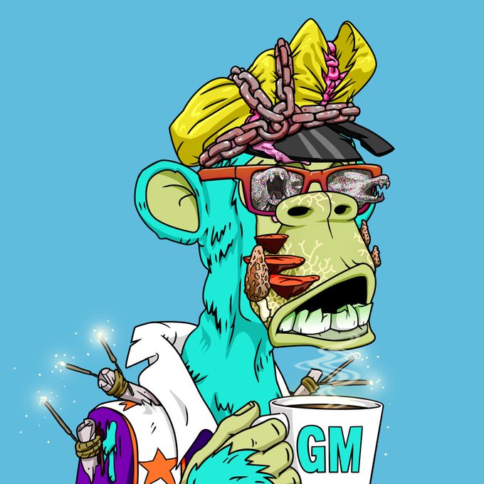 The image features a cartoon monkey wearing glasses, sunglasses, and holding a cup of coffee while standing against a blue background with white stars scattered around. The caption reads "GM GM" which seems to be related to the post about the gaming show.