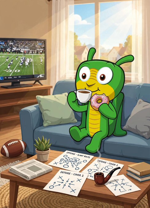 A cartoon illustration of a green caterpillar-like character with antennae sitting on a couch drinking coffee and holding a donut while watching football on TV, with play diagrams scattered on the table.