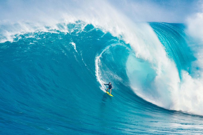 The image shows a surfer riding a large, curling wave with their surfboard. The photo has been edited to include text that reads "Thirsty Thursday. Clarity wave. Are you ready to ride?". This suggests that the image is related to surfing and possibly promoting a surfing event or competition.