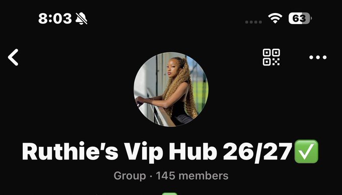 The image shows a screenshot of a WhatsApp group called "Ruthie's Vip Hub 26/27" with 145 members, featuring a profile picture of a woman with long braided hair. This connects to the post where the group admin is asking staked members to reach out via inbox since her WhatsApp contacts are inaccessible.