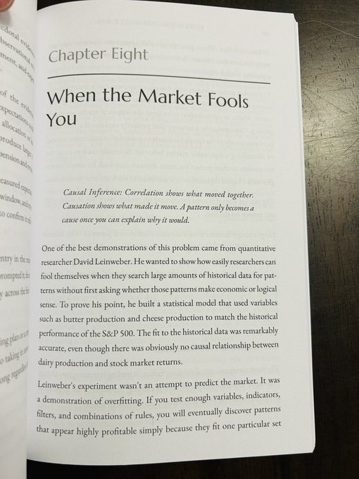 The image shows the opening page of Chapter Eight, titled "When the Market Fools You," from the book *How to Trade Like a Scientist*, which discusses causal inference and overfitting—specifically referencing researcher David Leinweber's famous example of correlating S&P 500 returns with butter production. This directly illustrates the post's theme of how the market can deceive traders by revealing misleading patterns that lack real causal logic.