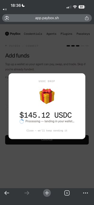 A screenshot of the PayBox app (app.paybox.sh) shows a "USDC DROP" notification confirming $145.12 USDC is processing and landing in the user's wallet, supporting the post's claim of receiving a free $150 USDC after connecting their Claude account.