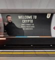 A large billboard reading 'WELCOME TO CRYPTO' with a person pictured beside text promoting benefits of crypto.