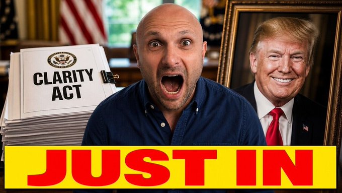 A man reacts with surprise in front of a stack of papers labeled "CLARITY ACT" and a portrait of Donald Trump, with "JUST IN" prominently displayed, suggesting an urgent news update. This image directly relates to the post by visually representing the "Clarity Act" mentioned and hinting at a significant political event covered in the linked video.