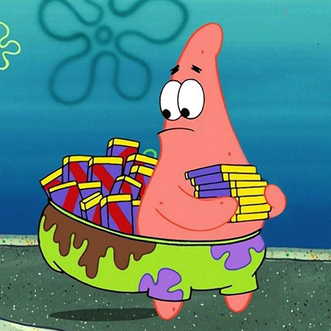 The cartoon character Patrick Star from SpongeBob SquarePants is shown carrying a large stack of colorful wrapped presents.