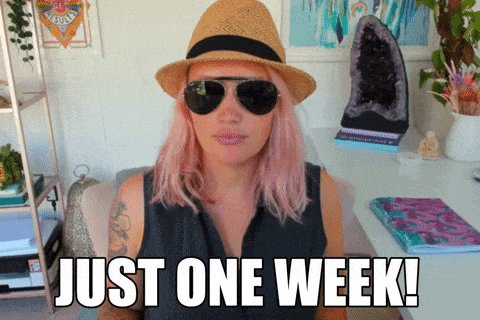 iced tea and a book on the desk, with a pink-haired woman wearing sunglasses and a straw hat, and text reading "Just One Week!"