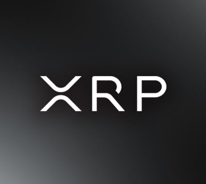 The image displays the white "XRP" logo on a dark gradient background, representing the XRP cryptocurrency brand. This visual ties directly to the accompanying announcement about the XRP Ledger's v3.2.0 upgrade, highlighting the cryptocurrency's growing institutional support.