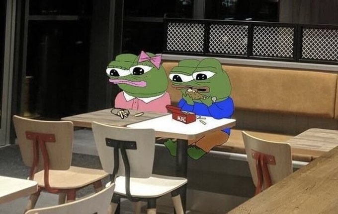 A meme image featuring Pepe the Frog characters sitting at a KFC table in a fast food restaurant booth.