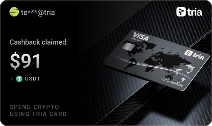 A promotional graphic for the tria crypto card showing a cashback claim of $91 in USDT, featuring a black premium Visa card with a world map design and the text 'SPEND CRYPTO USING TRIA CARD'.