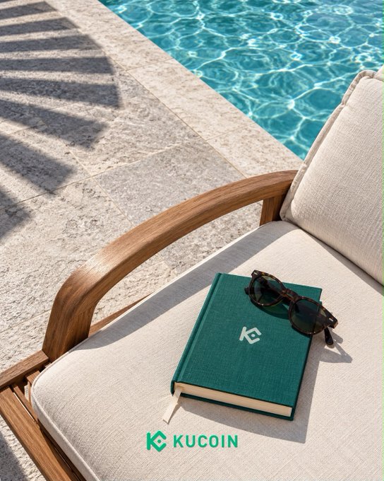 A hardcover book and tortoiseshell sunglasses rest on a cushioned teak lounge chair beside a sparkling pool, with the "KUCOIN" logo displayed below—evoking a calm summer moment of slow, focused learning that pairs naturally with the post's message of steady, chart-by-chart progress.