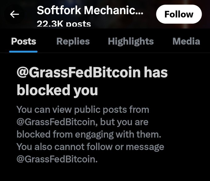 A screenshot of the "Softfork Mechanic" Twitter/X profile (22.3K posts) shows a notification that "@GrassFedBitcoin has blocked you," limiting engagement despite public posts remaining viewable. The image highlights the social media tension between Bitcoiners, with the accompanying post warning of upcoming "big blocks" for those not running the "right node"—suggesting the user was blocked likely due to their stance in an ongoing Bitcoin protocol debate.