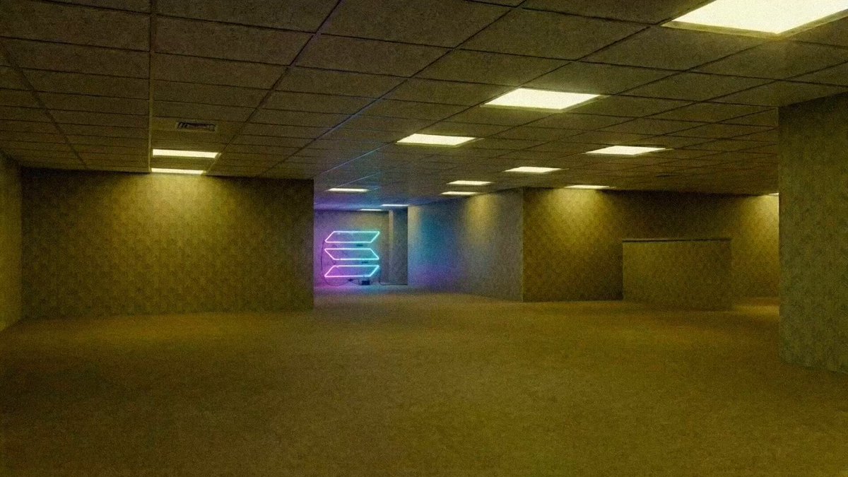 The image shows a room with a neon sign that reads "welcome to the solana backrooms". The room appears to be empty, with no people or furniture visible. The walls are made of concrete, giving the space an industrial feel. The floor is covered in carpeting, providing a contrast to the concrete walls and ceiling. The neon sign stands out against the otherwise monotonous color scheme of the room.