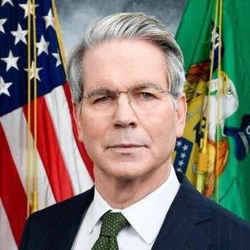 Treasury Secretary Scott Bessent, shown in an official portrait with the American flag and Treasury Department flag behind him, recently concluded 12-hour talks with Chinese Vice Premier He Lifeng covering economics and AI.