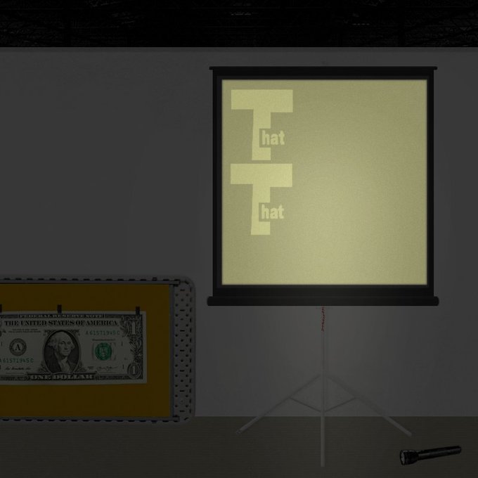 A projection screen displaying the word 'That' repeated twice in large letters, with a $1 bill visible on a case to the left and a microphone on the floor.