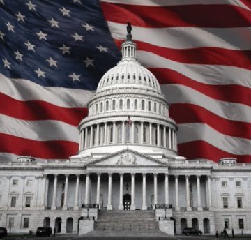 The image shows the U.S. Capitol building set against a large waving American flag, symbolizing the legislative negotiations referenced in the post. It visually reinforces the breaking news about Senate Democrats' last-minute counterproposal on the CLARITY Act amid the urgent 17:15 UTC cloture vote deadline.