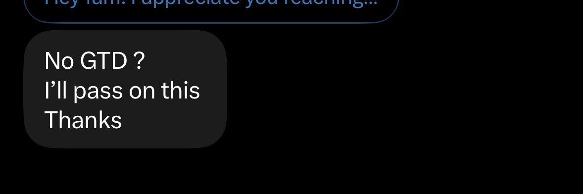 A dark-mode chat interface displaying a message that reads 'No GTD? I'll pass on this Thanks' as a reply to an unread message above.