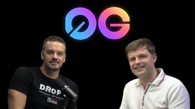 Two men sitting in front of a large "OG" logo, likely in a podcast or interview setting, with one wearing a black t-shirt reading "DROP IT LIKE IT'S HOT HAPPENS."