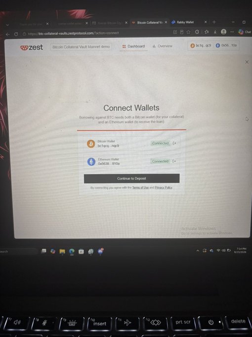 A laptop screen displaying a 'Connect Wallets' interface on zesty.io for Bitcoin Collateral Vault Mainnet demo, showing connected Bitcoin and Ethereum wallets.