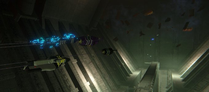A dark sci-fi scene with characters and spaceships flying through a cavernous, metallic structure with blue glowing energy trails.