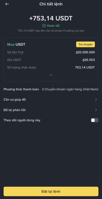 A mobile trading app screen in Vietnamese showing a completed order to buy +753.14 USDT for ₫20,000,000 via bank transfer, with a 'Đặt lại lệnh' button at the bottom.