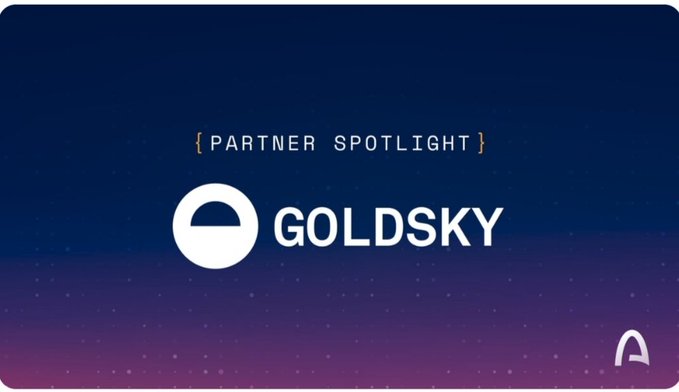 The image features a logo for a company named "Goldsky". The logo consists of a white circle with a black dot inside, surrounded by purple stars against a blue background. Below the logo, there is text that reads "Partner Spotlight" followed by the name "Goldsky", and it also mentions that the company brings the data infrastructure layer needed for developers to build on the @arc ecosystem.