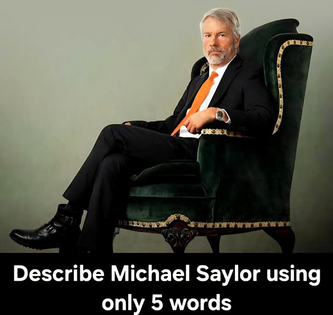 A portrait of Michael Saylor sitting in a green velvet armchair wearing a dark suit and orange tie, with text reading 'Describe Michael Saylor using only 5 words'.