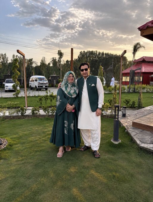 A couple poses for a photo on Independence Day, dressed in festive green attire, suggesting a celebration of joy and upcoming success.