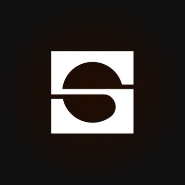 A white stylized "S" logo on a black background, representing Saturn Credit, the company featured in the announcement of its partnership with Ondo to integrate tokenized stocks into its digital credit ecosystem via the STRCon and $sUSDat stablecoin.