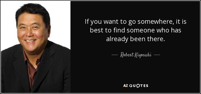 A quote graphic on a black background featuring a smiling man in a suit next to the text 'If you want to go somewhere, it is best to find someone who has already been there.' by Robert Kiyosaki, from AZ QUOTES.