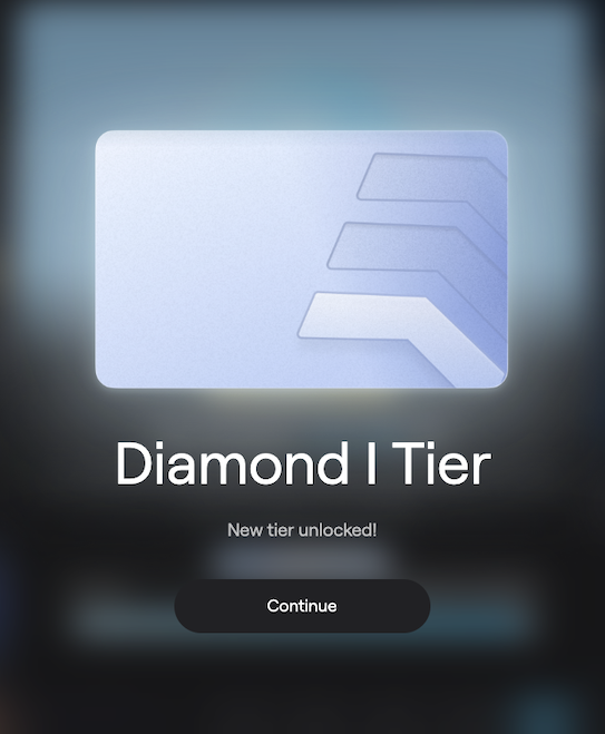 An app screen showing a 'Diamond I Tier' unlocked notification with a Continue button.