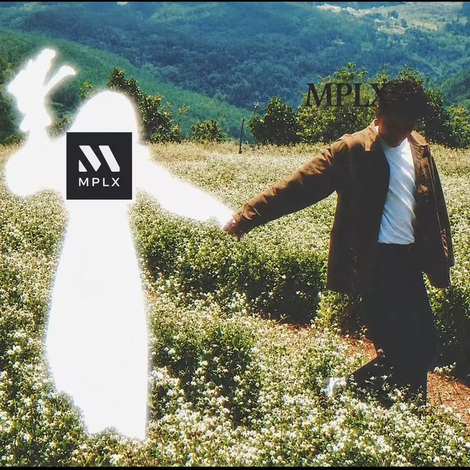 A man in a brown jacket stands in a field of white flowers holding the hand of a glowing, angel-like figure, with the 'MPLX' logo overlaid on the image.