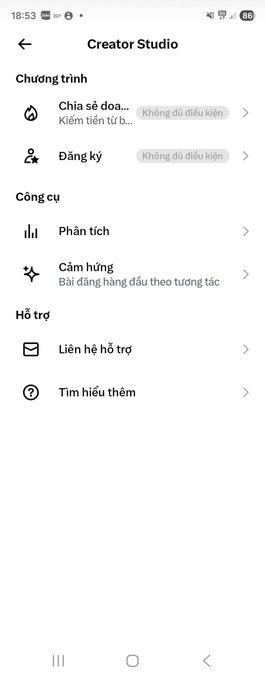 The image shows a TikTok "Creator Studio" menu in Vietnamese, displaying sections like "Chương trình" (Programs) and "Công cụ" (Tools) with options for "Chia sẻ doanh thu" (Revenue sharing) and "Đăng ký" (Subscribe), both showing "Không đủ điều kiện" (Not eligible) status. The screenshot relates to the post's theme of earning income on the platform, as the creator laments not being able to participate in monetization programs like #buildX and #payX while others share their earnings.