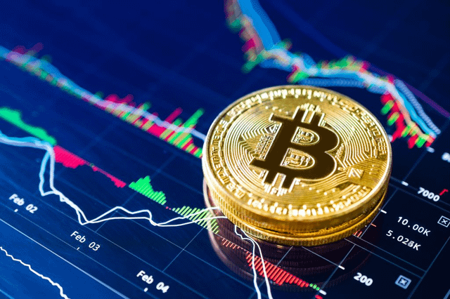 A gold Bitcoin coin rests atop a digital trading chart displaying candlestick patterns and price data dated Feb 02 through Feb 04, with values around $5,028K visible. The image visually represents the article's focus on Bitcoin's market liquidity and trading dynamics, underscoring the cryptocurrency's price movements as a backdrop to the discussion of strategic financial options.