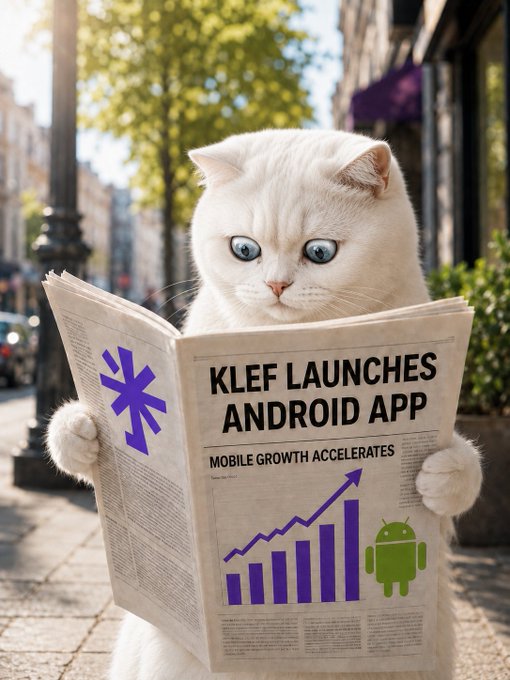 A white cat with blue eyes holding up a newspaper with the headline 'KLEF LAUNCHES ANDROID APP' and a subheading 'MOBILE GROWTH ACCELERATES', accompanied by a purple asterisk-like symbol, a rising bar chart, and an Android robot logo.