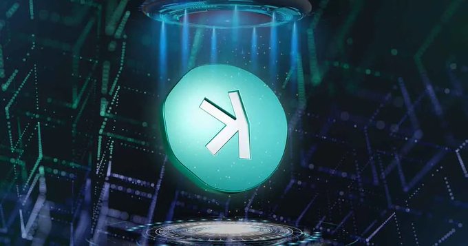 A glowing teal digital coin or token featuring the Kusama (KSM) logo, floating in a futuristic, digital environment with blue light beams and particle effects.