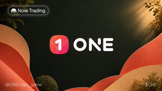 A promotional graphic announces that $ONE is "Now Trading" on Kraken, featuring the token's pink and orange logo against a dark background with flowing red shapes and green foliage. The image visually reinforces the launch announcement, displaying the ticker "$ONE," the social handle "@ONEchain_game," and the trading platform callout.