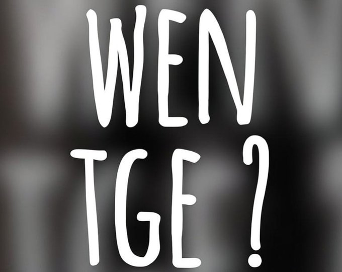 The image displays the phrase "WHEN TGE?" in large, hand-drawn white text against a blurred black background, with "TGE" standing for "Token Generation Event"—a common question crypto investors ask about upcoming token launches. This visually reinforces the post's context about accessing quantum and high-performance compute through Quip Network's rental model, suggesting readers are eagerly awaiting the project's token generation event.