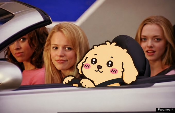A scene from a Paramount film shows three young women in a convertible car, with a cartoonish cute puppy sticker edited into the passenger seat.
