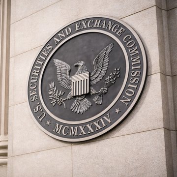 The image shows the official seal of the U.S. Securities and Exchange Commission, featuring an eagle with outstretched wings holding an olive branch and arrows, surrounded by the text "U.S. SECURITIES AND EXCHANGE COMMISSION" and the Roman numerals "MCMXXXIV" (1934), the year the SEC was established. This seal represents the regulatory body referenced in the post about ongoing communications with the White House.