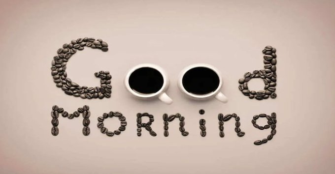 A flat-lay photograph shows two cups of coffee arranged among coffee beans to spell out 'Good morning' on a neutral background.