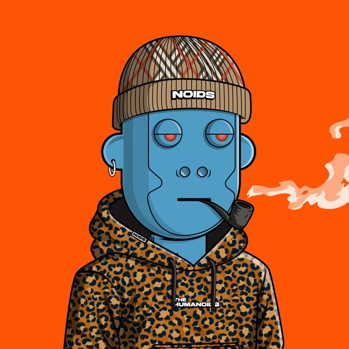 Stylized illustration of a blue-skinned NFT character with red eyes, wearing a patterned beanie labeled 'NOIDS' and a leopard print hoodie, smoking a pipe against an orange background with 'THE HUMANOID 3' text.