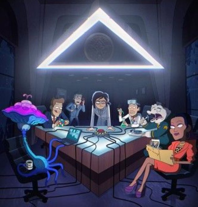 A cartoon depicting an Illuminati-style meeting under a glowing triangular symbol, featuring a glowing octopus creature plugged into a laptop, a UFO-like character, military officials, scientists, and a woman in red at a conference table.