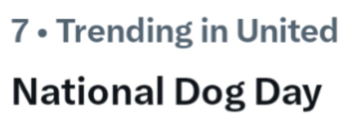 Text on a white background reading '7 • Trending in United National Dog Day' in blue and black lettering.