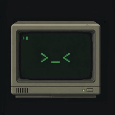 An old computer monitor displays a green ASCII face with an angled frown and a prompt symbol, suggesting an error or command line.