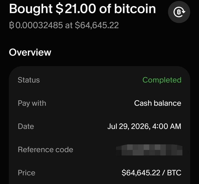 A dark-mode mobile screenshot confirming 'Bought $21.00 of bitcoin' for ₿0.00032485 at $64,645.22, with the status marked as 'Completed' on Jul 29, 2026.