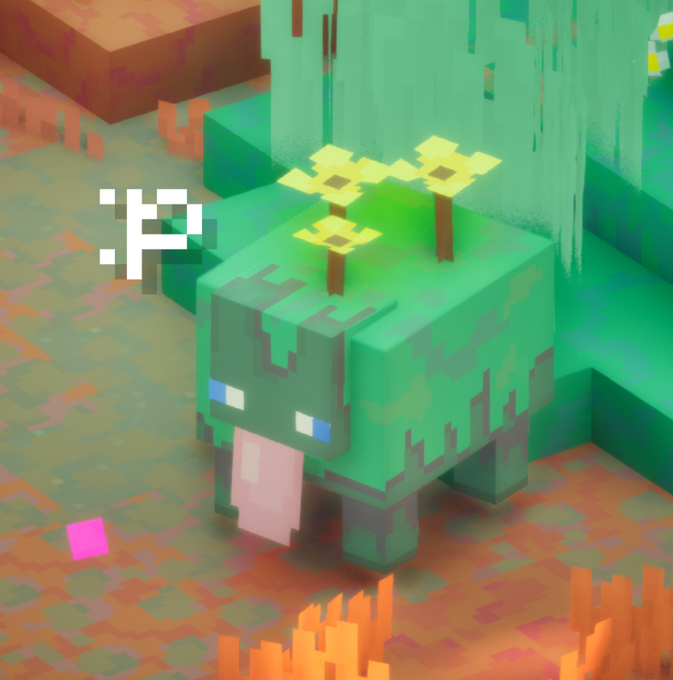 A blocky, pixelated green creature with a long pink tongue, blue eyes, and yellow flowers sprouting from its back stands in a Minecraft-style blocky landscape.