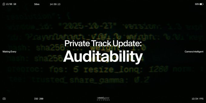 The image displays "Private Track Update: Auditability" in bold white text against a background of code showing metadata details like "version," "hash," "fps," and "trusted_share_gamma." This visually reinforces the post's message about making private tracks verifiable, with the code backdrop symbolizing the transparent, technical audit process where challenge data from top performers is published for public review.